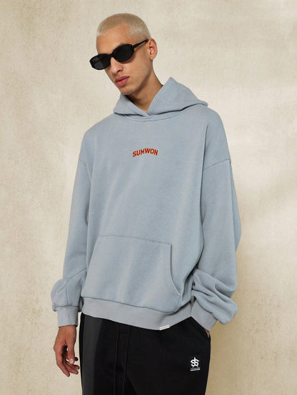 Stylish Pullover Hoodie with Unique Print and Relaxed Fit